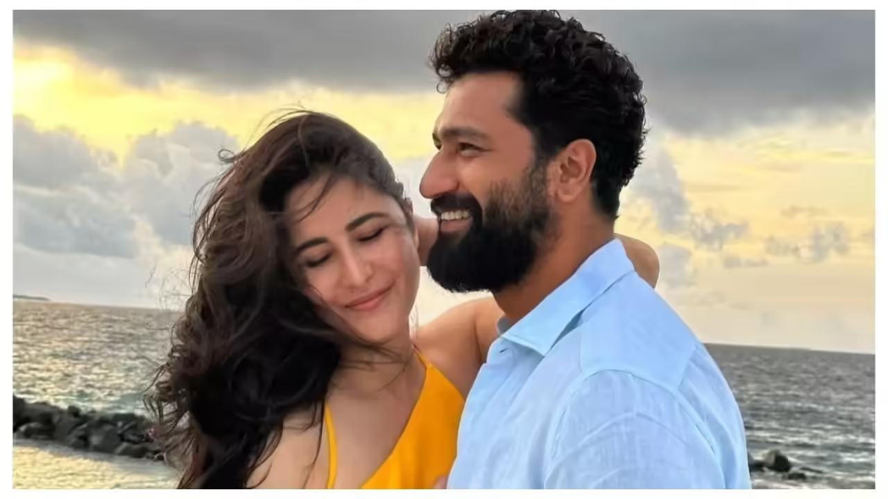 Vicky Kaushal cradles Katrina Kaif’s baby bump in pregnancy announcement photo.