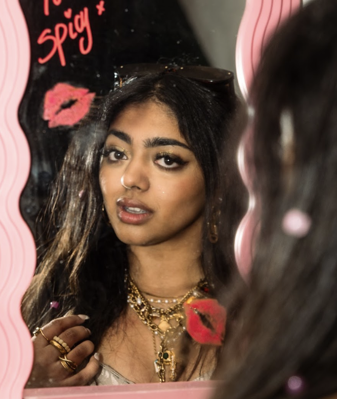 Niki Kini shares quirky, tongue-in-cheek single “Weatherman”